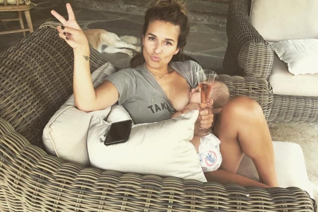 Jesse James Decker breastfeeding while drinking wine