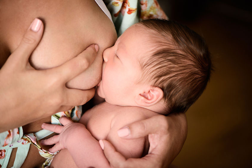 newborn baby breastfeeding