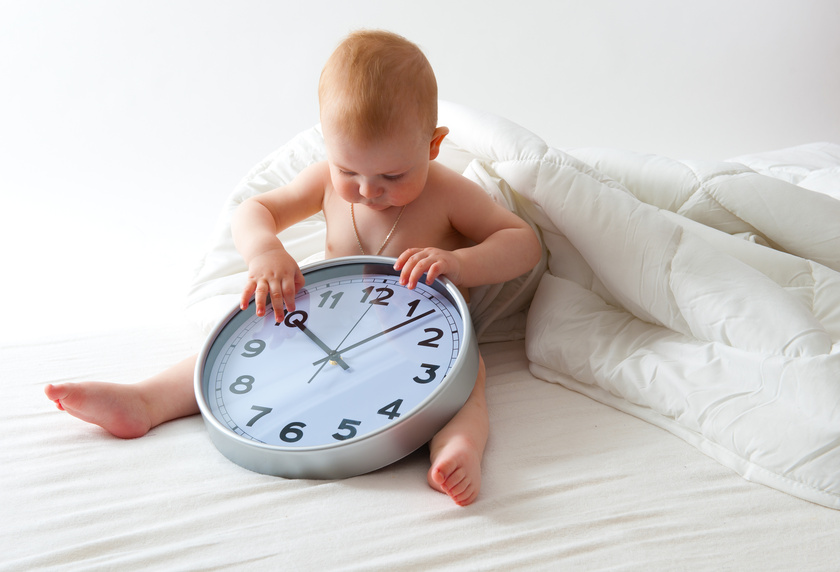 baby with clock